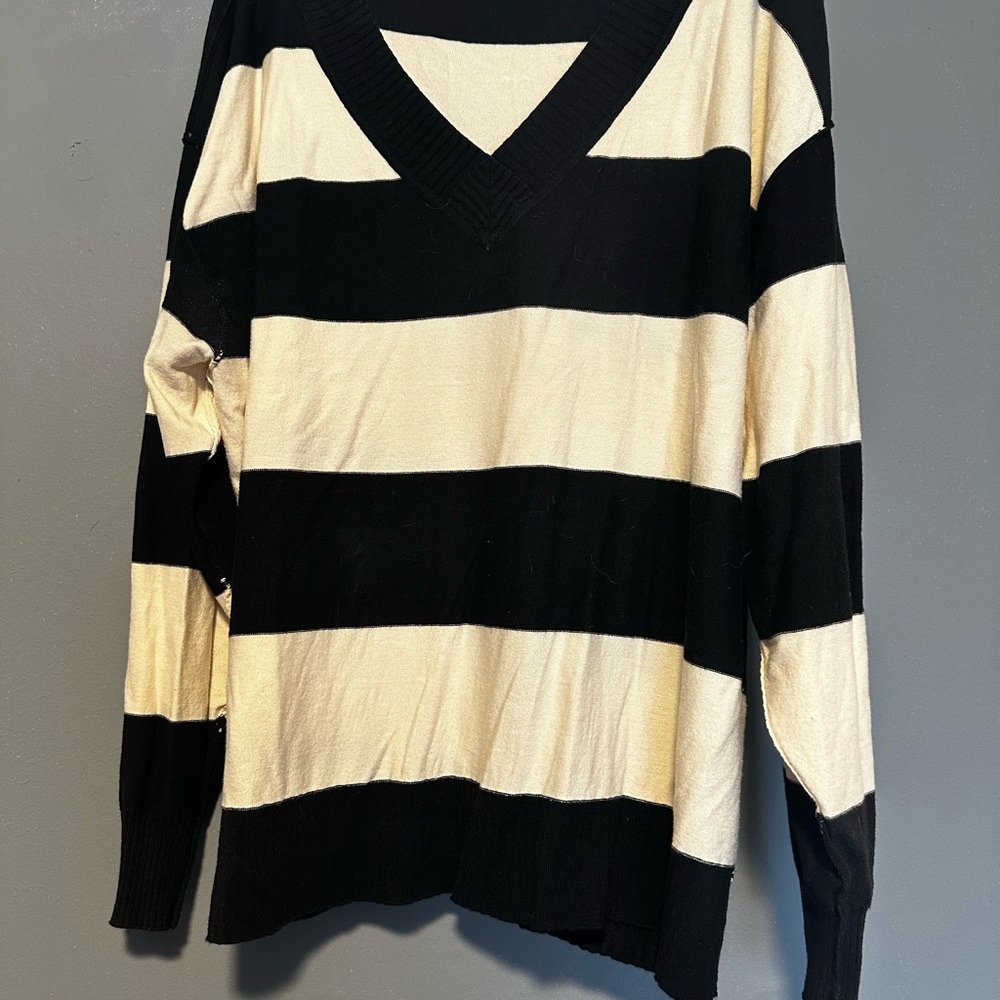 Woman’s Black & Cream Striped V-Neck Sweater